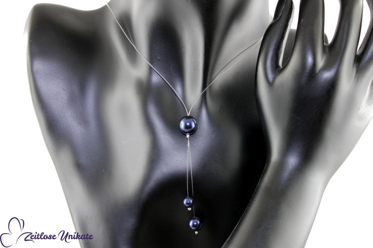 transparente Kette mit dunkelblauer Swarovski® Crystal Pearls - schwebende Perlen